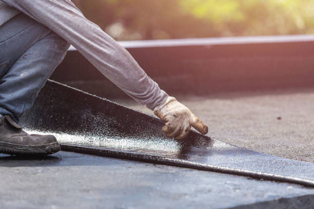 Professional Basement Waterproofing technician working in Howard, OH